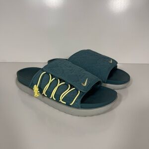 Nike Teal Quilted Slide Sandals with Yellow Accents